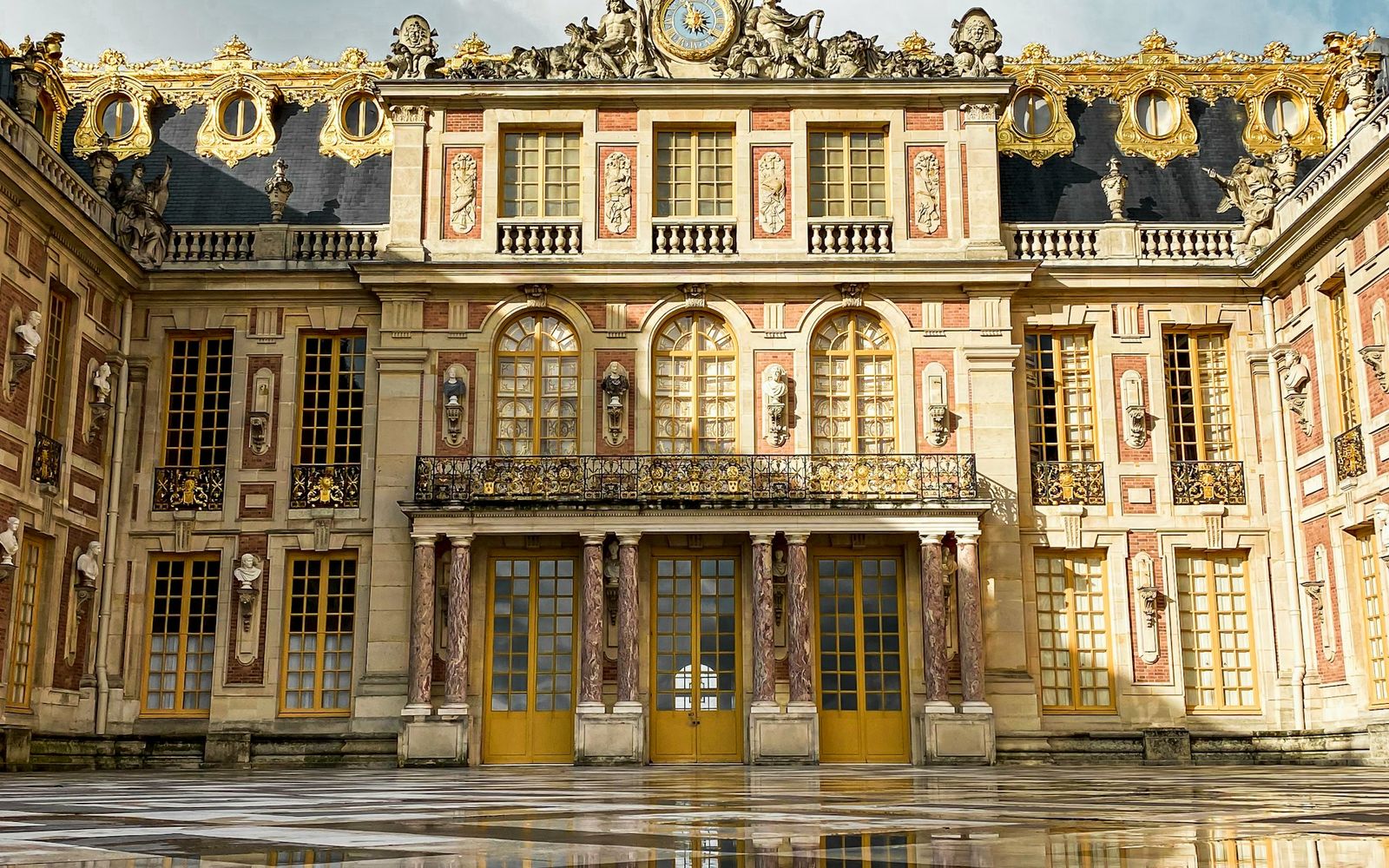 The Marble Courtyard of the Palace of Versailles
